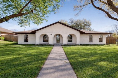Completely remodeled and move-in ready, this stunning home is - photo 1