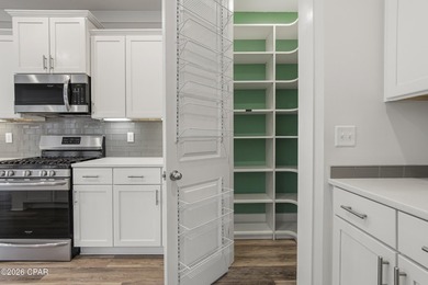 Enjoy the best of SweetBay living in this beautifully upgraded - photo 10