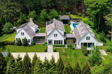 Nestled on two picturesque acres, this stunning property - photo 1