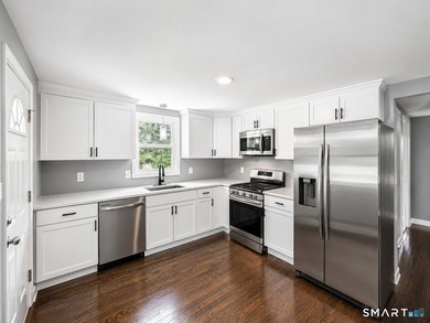 Move right into this beautifully renovated Cape-style home - photo 2