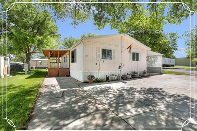 Welcome home to this inviting 3-bedroom, 2-bath manufactured - photo 1