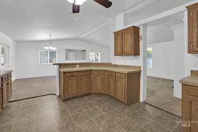 Welcome home to this inviting 3-bedroom, 2-bath manufactured - photo 6