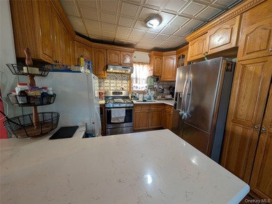 Welcome to this well maintained 5-bedroom, 2-bathroom home in - photo 9