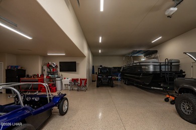 Check out the massive double RV garage on this custom built pool - photo 34