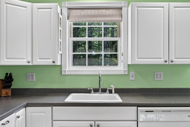 Quality-built and low maintenance, this charming two-bedroom - photo 14