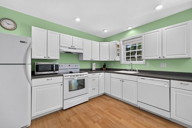 Quality-built and low maintenance, this charming two-bedroom - photo 16