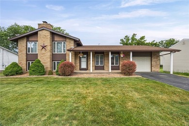 Welcome to your dream home nestled in the Town of Greece! This - photo 1