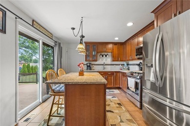 Welcome to your dream home nestled in the Town of Greece! This - photo 9