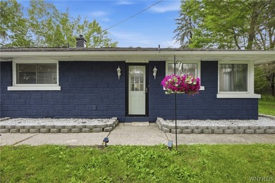 Nestled on 2 scenic acres surrounded by mature trees, this - photo 1