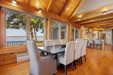 A level lot. A walk-in sandy beach. Over 200 feet of Lake - photo 11