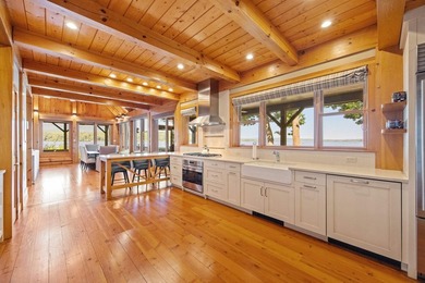 A level lot. A walk-in sandy beach. Over 200 feet of Lake - photo 13