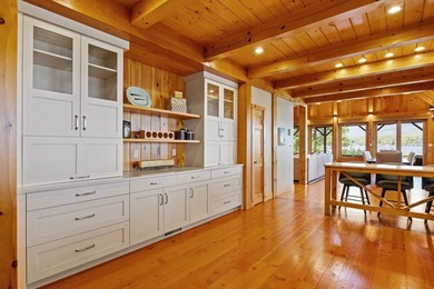 A level lot. A walk-in sandy beach. Over 200 feet of Lake - photo 28