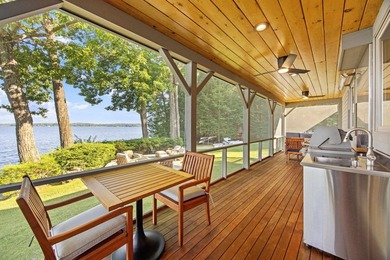 A level lot. A walk-in sandy beach. Over 200 feet of Lake - photo 30