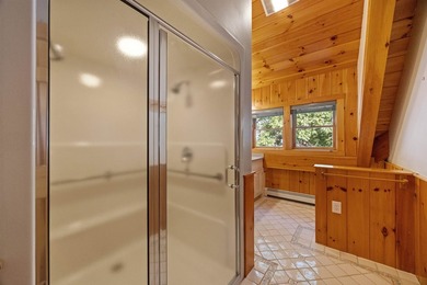 A level lot. A walk-in sandy beach. Over 200 feet of Lake - photo 35
