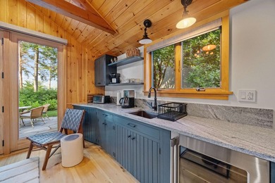 A level lot. A walk-in sandy beach. Over 200 feet of Lake - photo 49