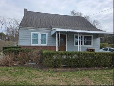 Welcome to this charming Cape style home located at 33 Brown St - photo 1