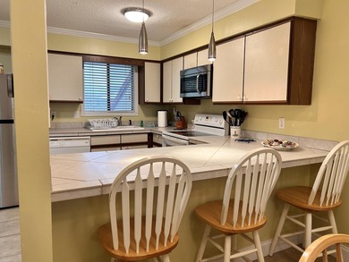 Experience waterfront living at The Palms of Sunset Harbor on - photo 9