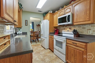 Welcome home to this meticulously maintained island beauty - photo 15