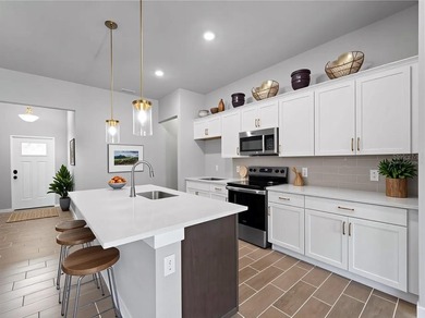 One or more photo(s) has been virtually staged. Tile throughout - photo 3
