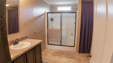 This charming 1,350 sq ft manufactured home sits on a permanent - photo 18