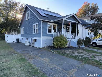 Situated on a quiet dead-end street in the desirable town of - photo 1