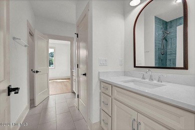 Experience elevated coastal living in this stunning new - photo 11