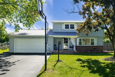 Welcome home to this beautifully updated property in the highly - photo 1