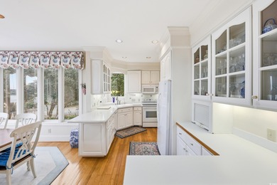 Set on a generous .44-acre homesite and positioned along one of