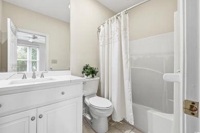 Set on a generous .44-acre homesite and positioned along one of