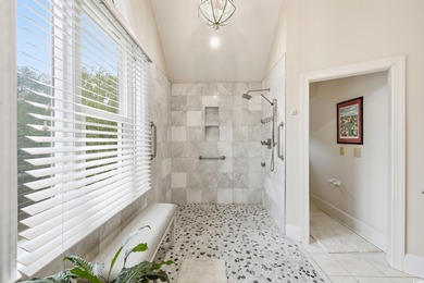 Set on a generous .44-acre homesite and positioned along one of