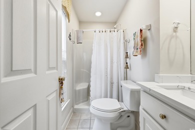 Set on a generous .44-acre homesite and positioned along one of