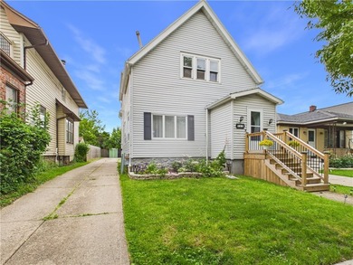 Take a look at this well-maintained owner-occupied two-family - photo 3