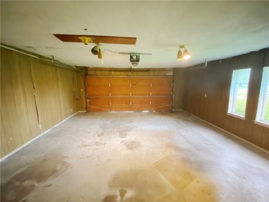 This four-side brick home in Rolling Acres subdivision has a lot - photo 11