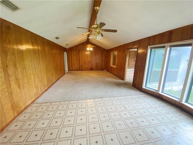 This four-side brick home in Rolling Acres subdivision has a lot - photo 12