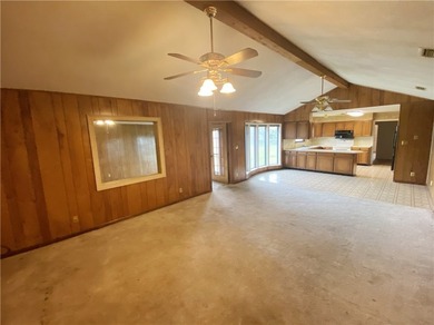 This four-side brick home in Rolling Acres subdivision has a lot - photo 13
