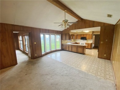 This four-side brick home in Rolling Acres subdivision has a lot - photo 14