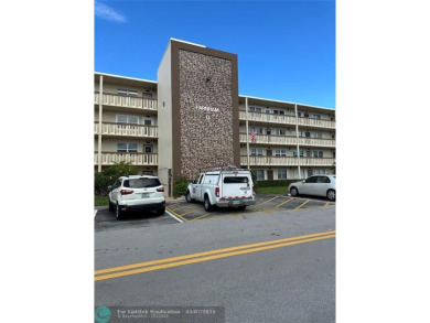 Lake Condo For Sale in Deerfield Beach, Florida
