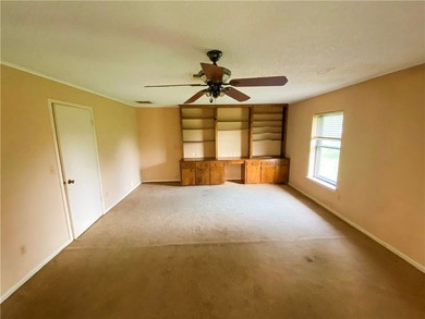 This four-side brick home in Rolling Acres subdivision has a lot - photo 22