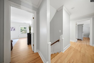 This stately all-brick home draws you in with its circle - photo 22