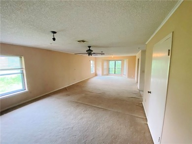 This four-side brick home in Rolling Acres subdivision has a lot - photo 23