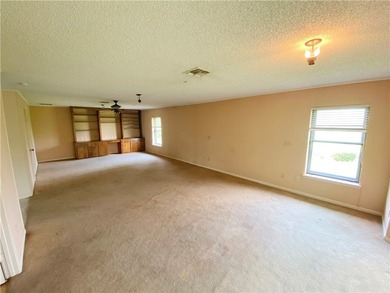 This four-side brick home in Rolling Acres subdivision has a lot - photo 24