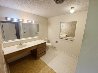 This four-side brick home in Rolling Acres subdivision has a lot - photo 25