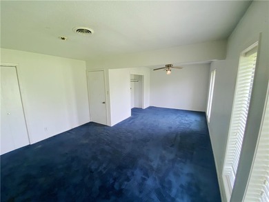 This four-side brick home in Rolling Acres subdivision has a lot - photo 31