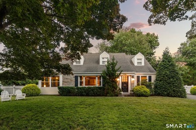 This classic New England Cape Cod is nestled just a short walk - photo 3