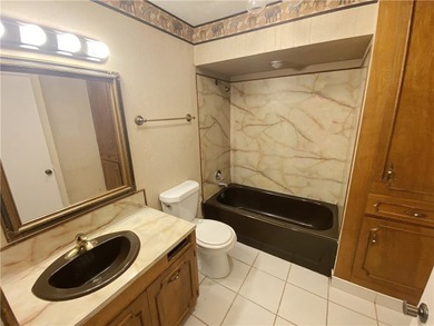 This four-side brick home in Rolling Acres subdivision has a lot - photo 37