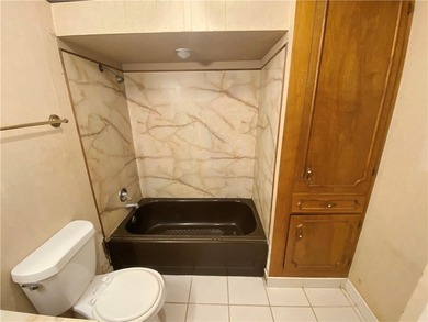 This four-side brick home in Rolling Acres subdivision has a lot - photo 38