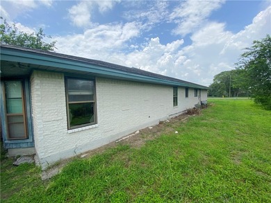 This four-side brick home in Rolling Acres subdivision has a lot - photo 39