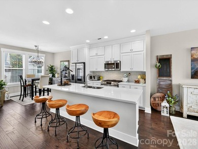 Welcome to this beautifully appointed 2 story/basement townhome - photo 1