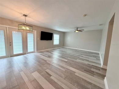 This tastefully remodeled 2 bedroom, 2 bath ground floor unit is - photo 2