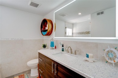 Welcome to a stunning, fully remodeled coastal retreat in the - photo 33